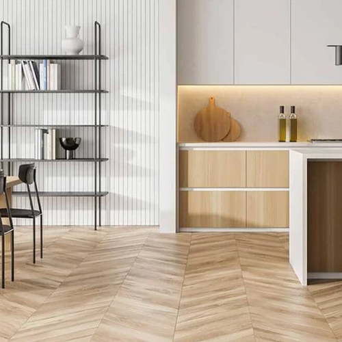 beautiful herringbone patterned hardwood floors in modern kitchen